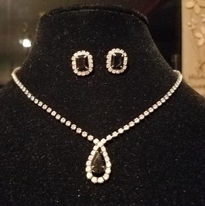 Tear drop pendant necklace with matching studs.
